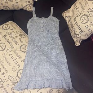 Stretchy, tight fit dress. Never worn no damage